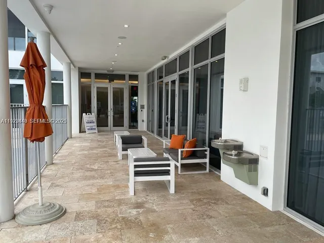a view of house with swimming pool outdoor seating area and furniture