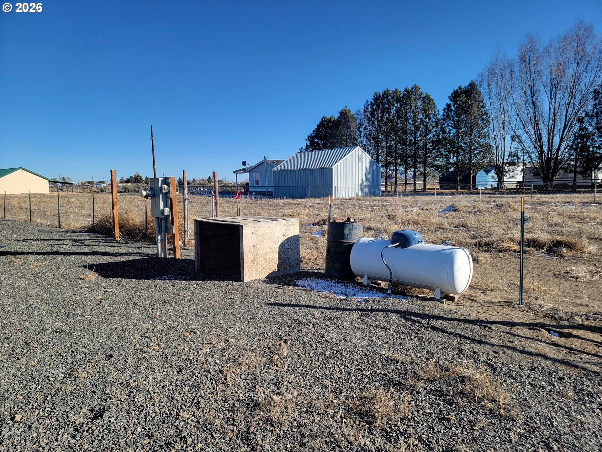 58098 Maple Circle Road Christmas Valley, OR 97641 - Photo 15 of 33 a view of a house with a yard