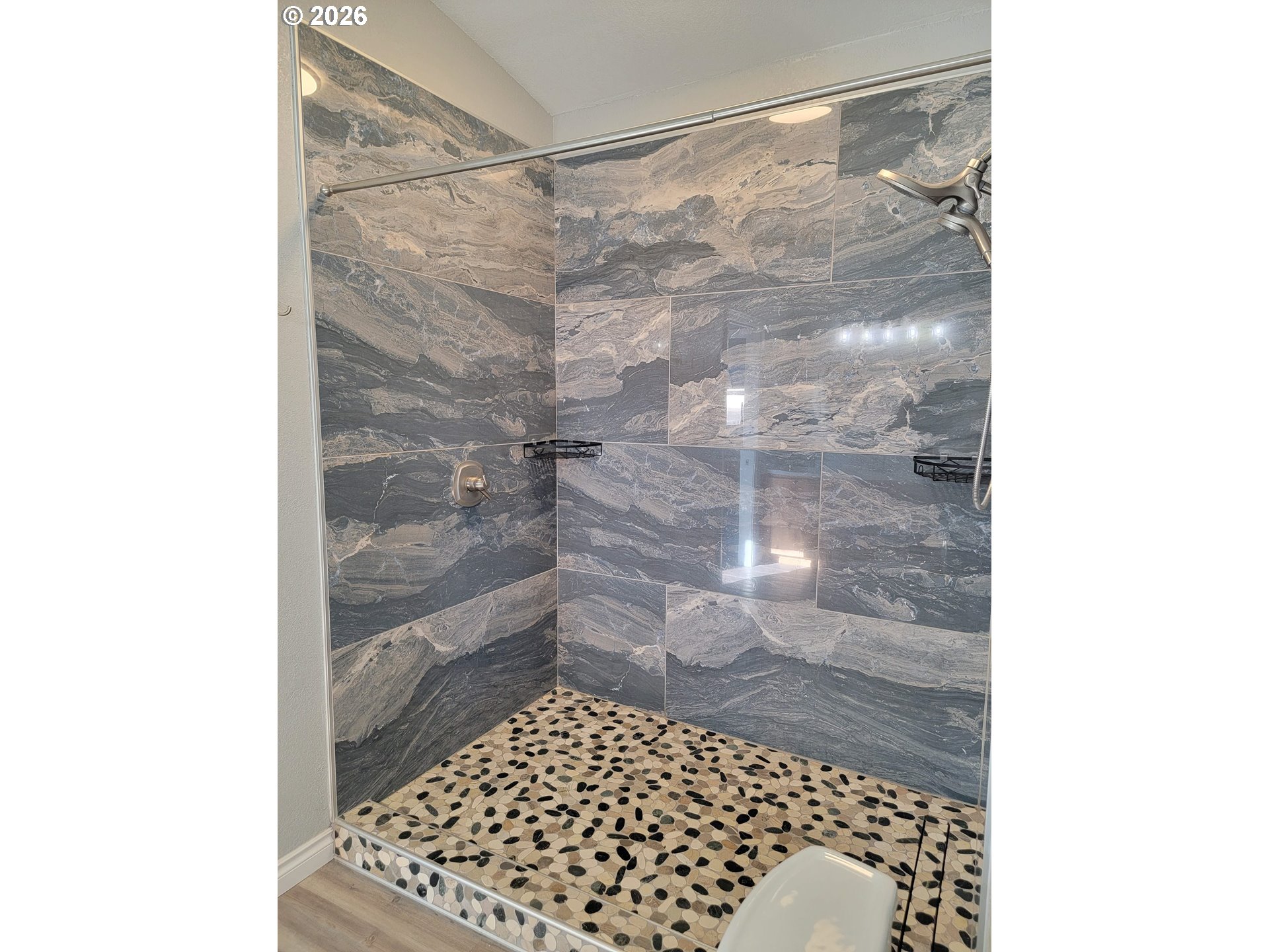 58098 Maple Circle Road Christmas Valley, OR 97641 - Photo 17 of 33 a bathroom with a shower