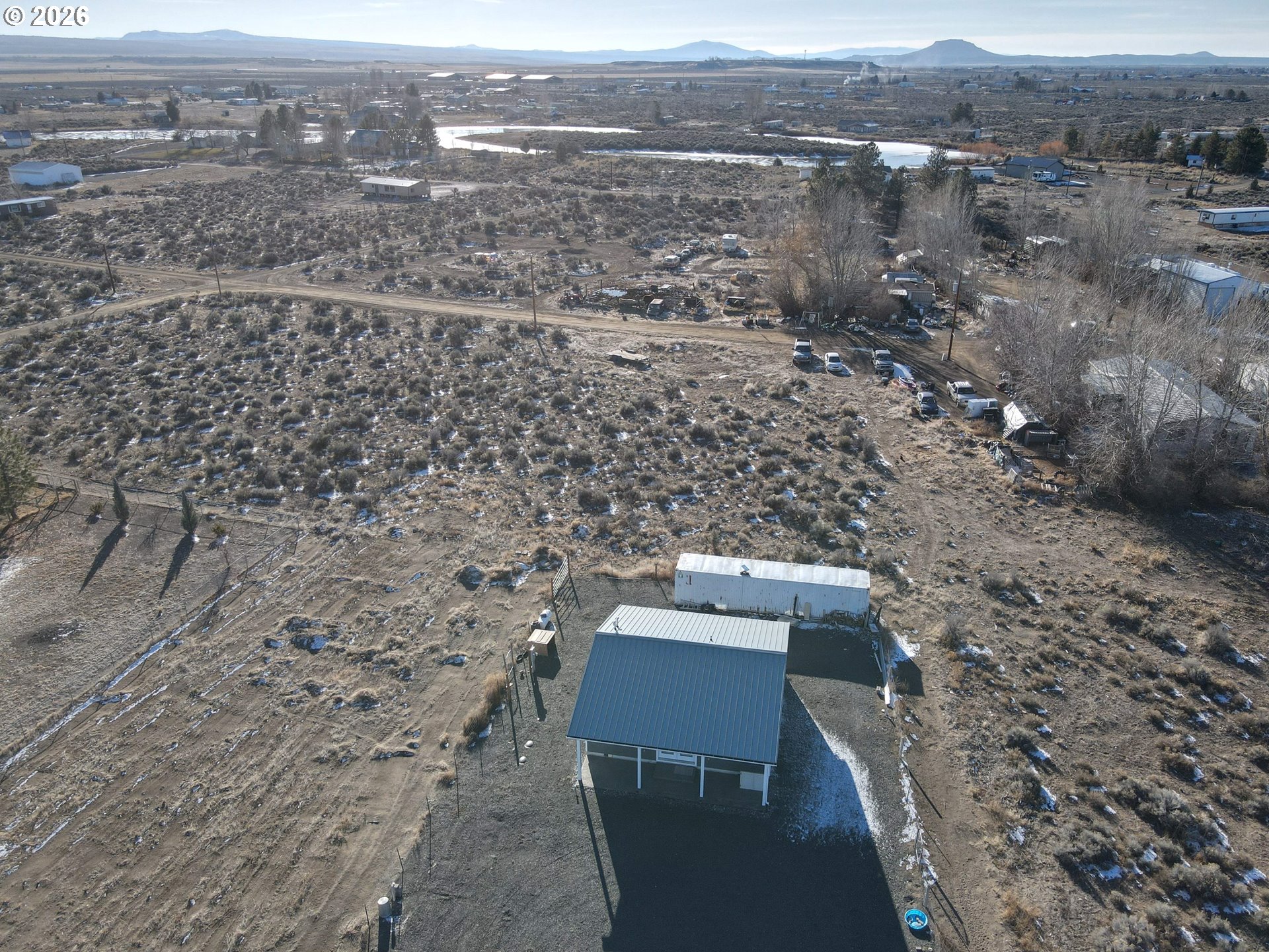 58098 Maple Circle Road Christmas Valley, OR 97641 - Photo 30 of 33 an aerial view of residential houses with outdoor space