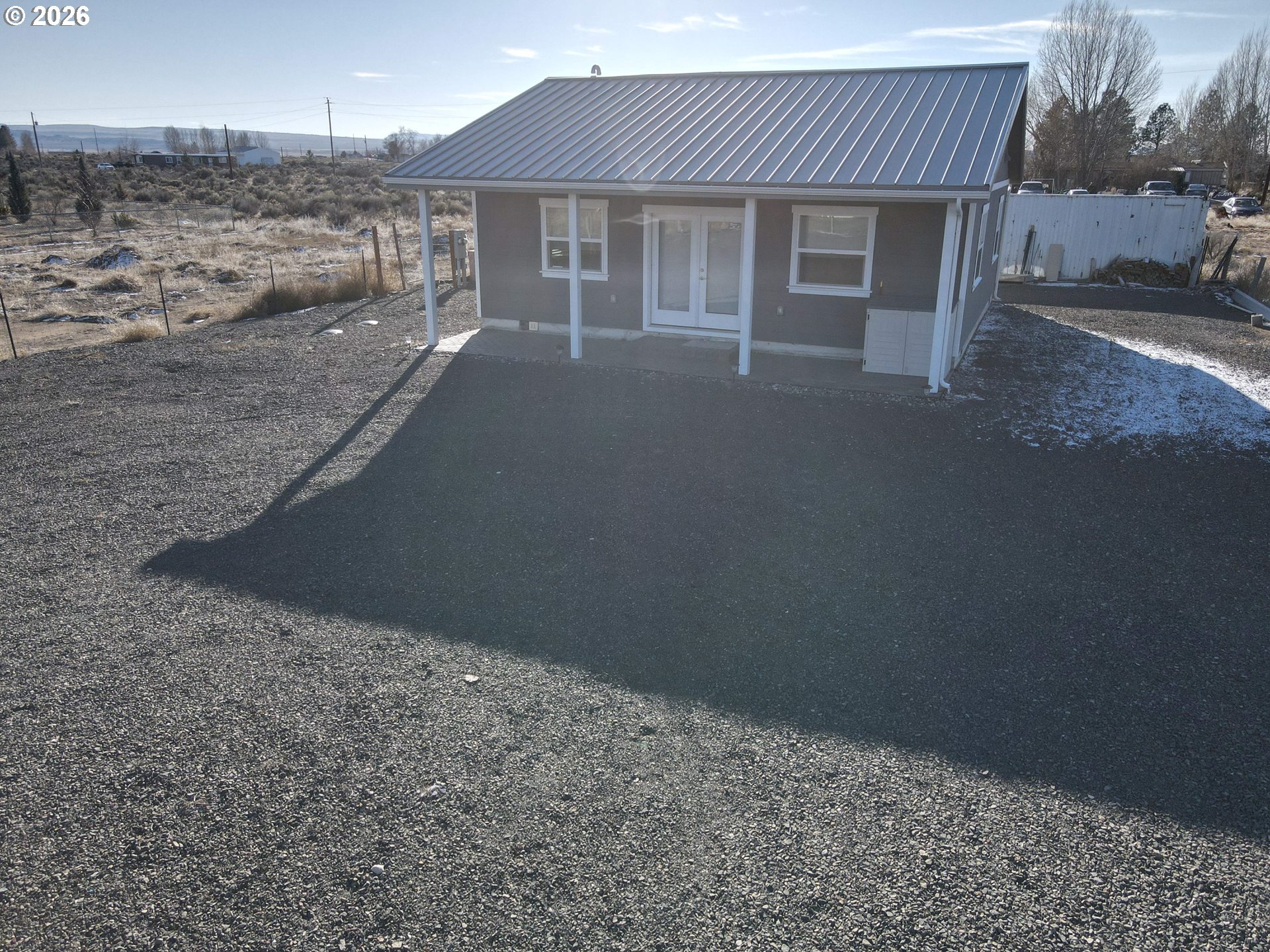 58098 Maple Circle Road Christmas Valley, OR 97641 - Photo 32 of 33 a front view of a house with a yard