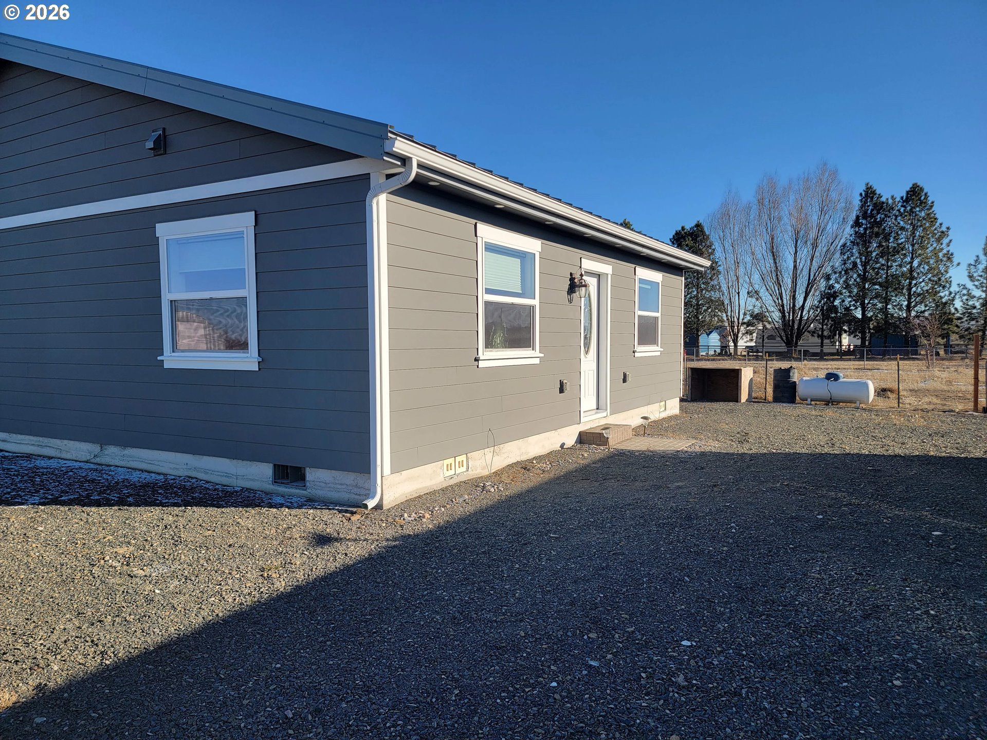 58098 Maple Circle Road Christmas Valley, OR 97641 - Photo 8 of 33 a view of a house with backyard