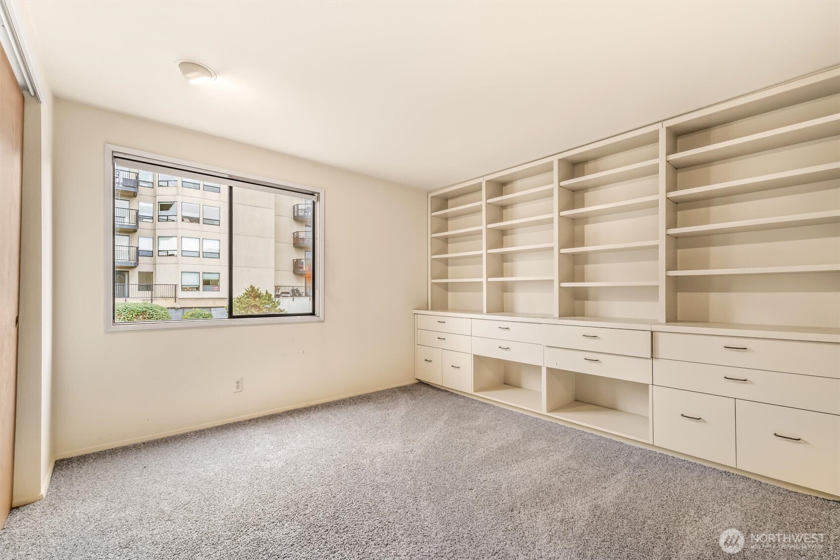 505 West Roy Street, Unit 304 Seattle, WA 98119 - Photo 19 of 33 a view of an empty room with a window