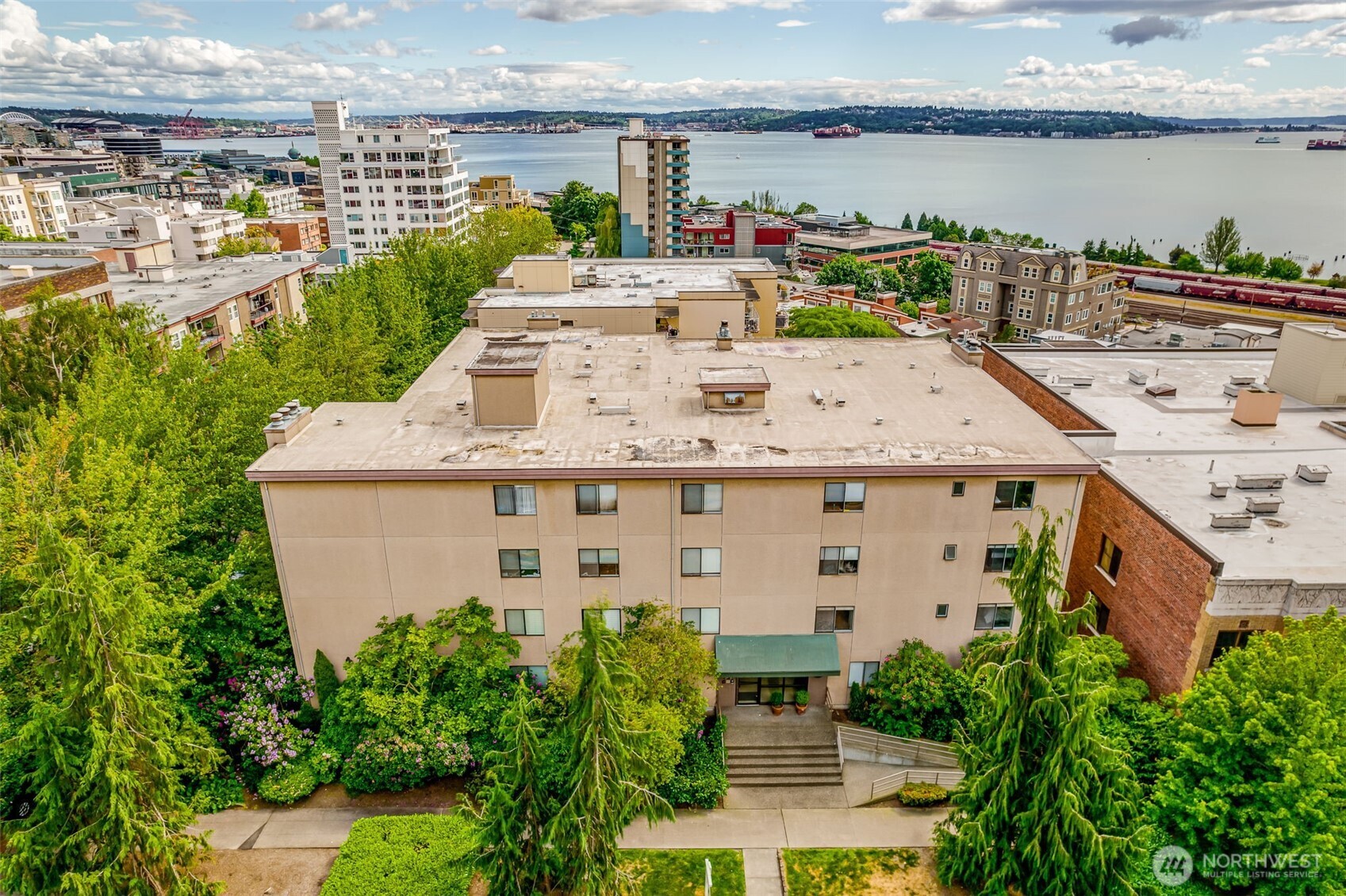 505 West Roy Street, Unit 304 Seattle, WA 98119 - Photo 28 of 33 an aerial view of a house with lake view and a terrace view