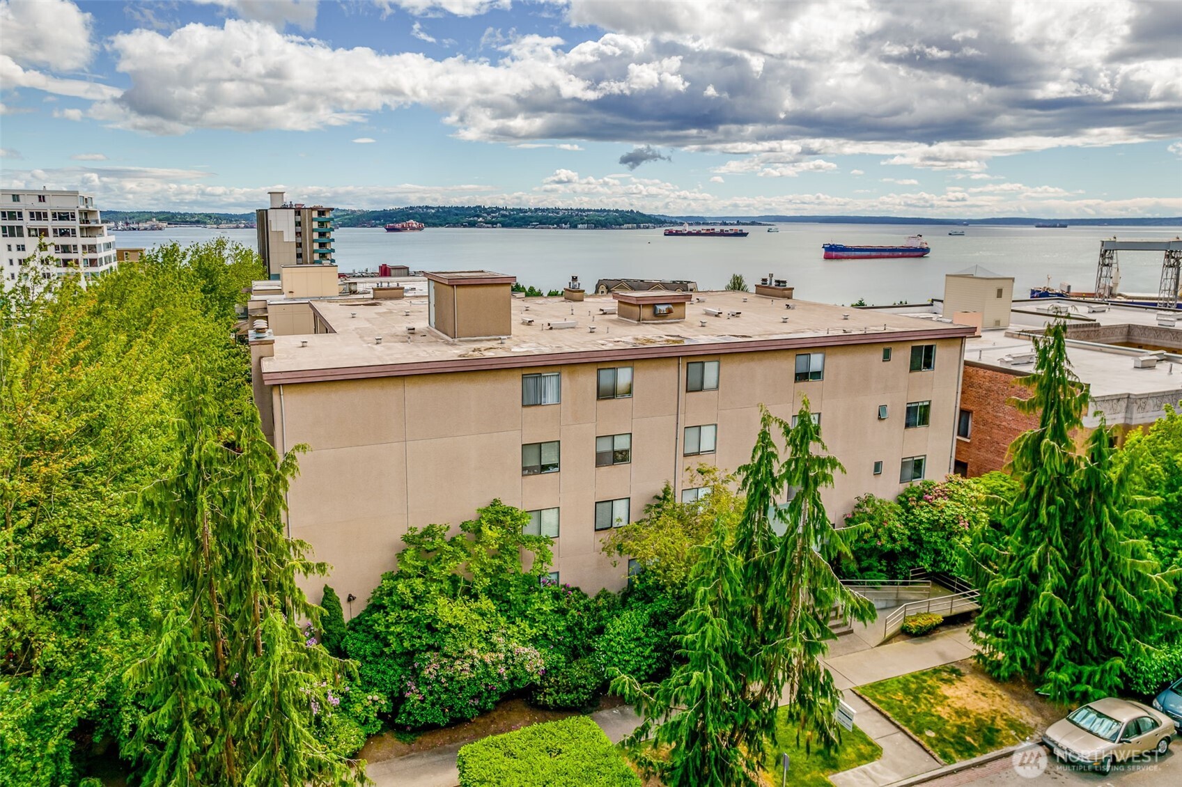 505 West Roy Street, Unit 304 Seattle, WA 98119 - Photo 29 of 33 a view of a swimming pool with outdoor space and plants