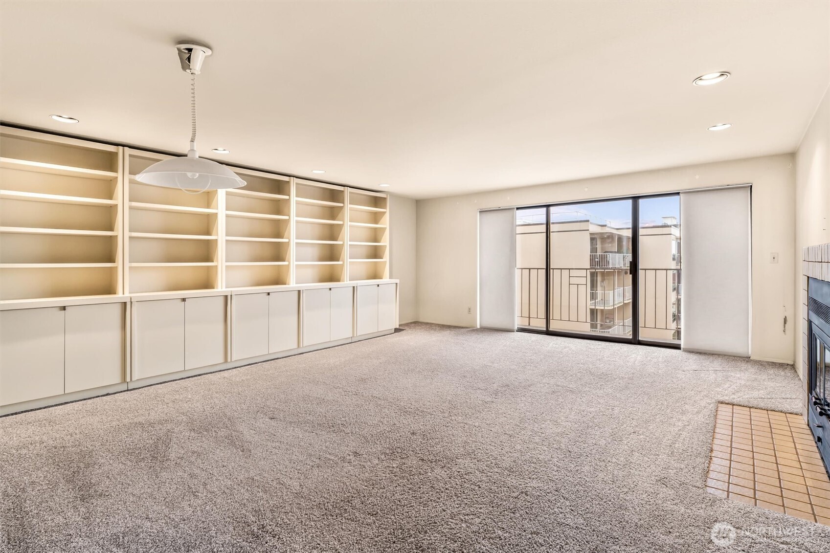 505 West Roy Street, Unit 304 Seattle, WA 98119 - Photo 8 of 33 a view of an empty room with a window