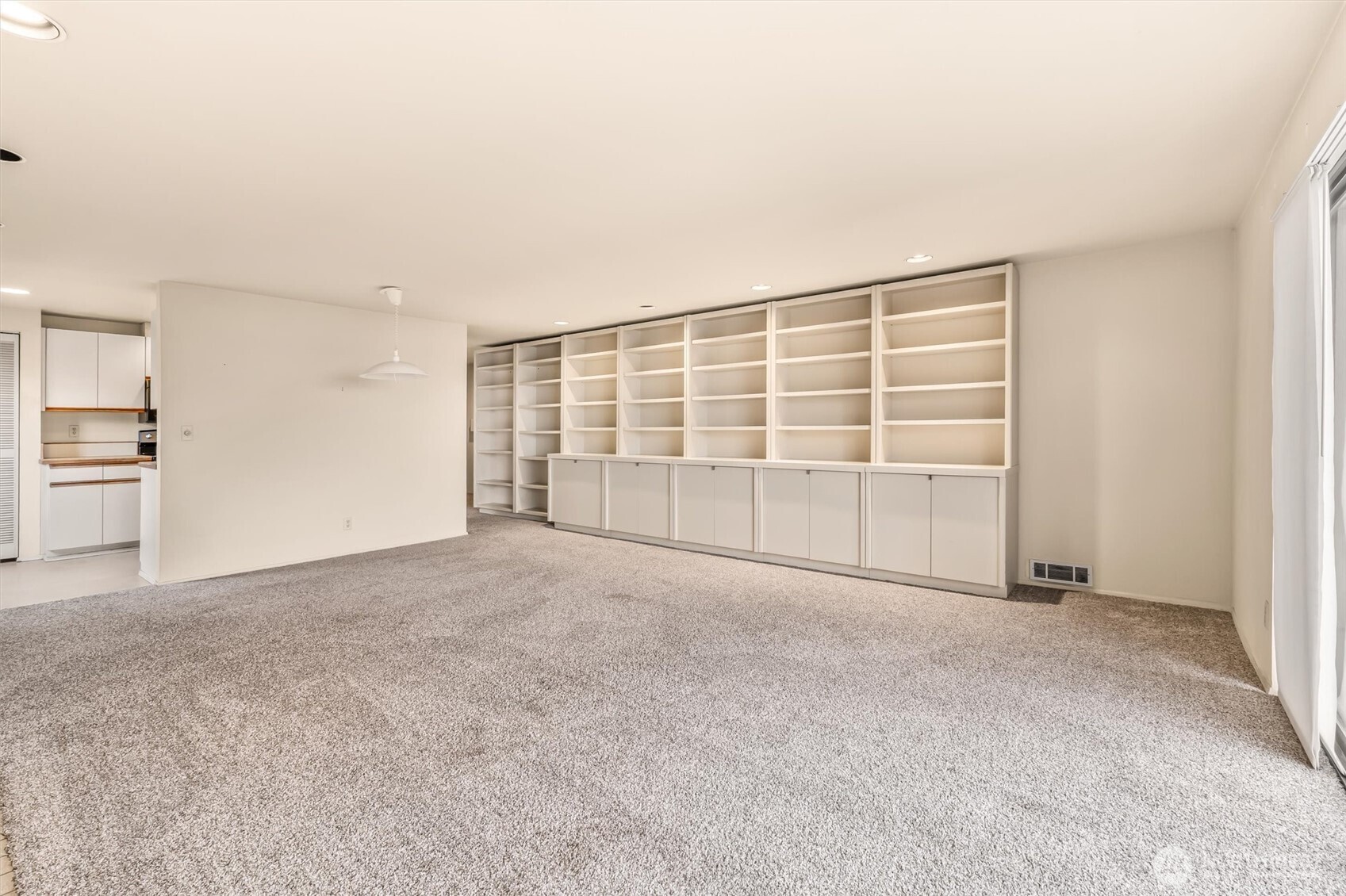 505 West Roy Street, Unit 304 Seattle, WA 98119 - Photo 9 of 33 a view of an empty room with a window