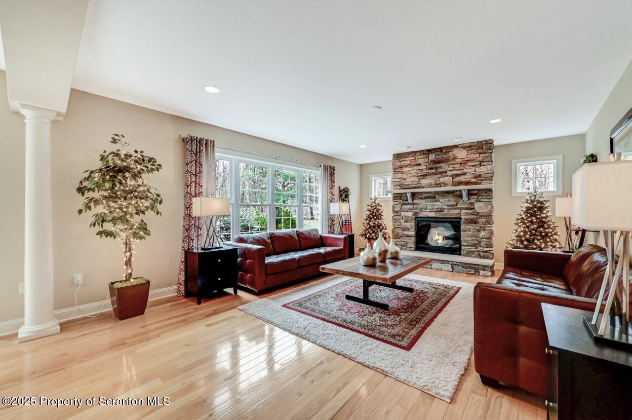 120 Highland Road Moscow, PA 18444 - Photo 33 of 84 a living room with furniture large window and a fireplace