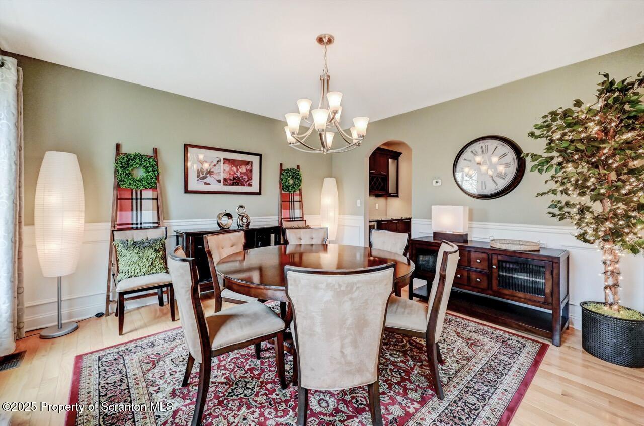 120 Highland Road Moscow, PA 18444 - Photo 5 of 84 a dining room with furniture a rug and wooden floor
