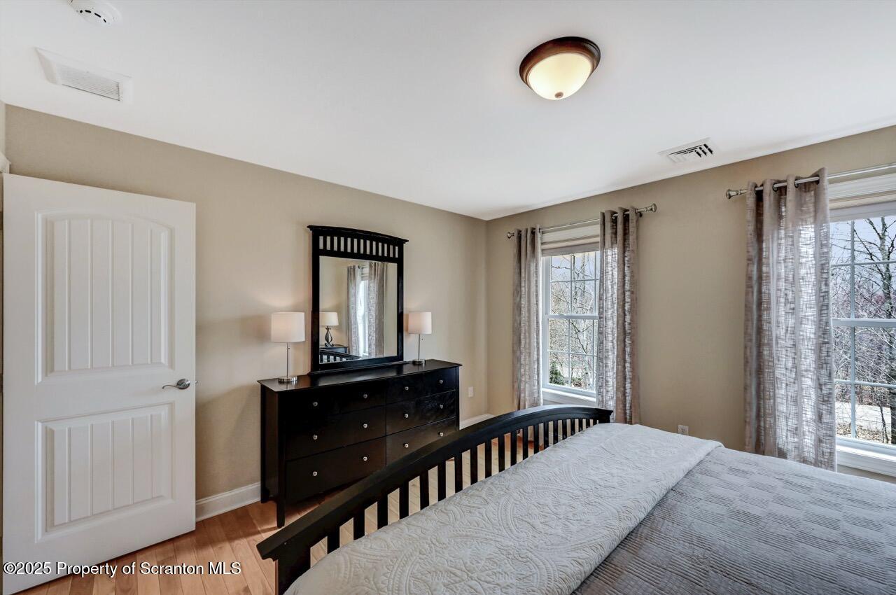 120 Highland Road Moscow, PA 18444 - Photo 57 of 84 a bedroom with a bed and a dresser