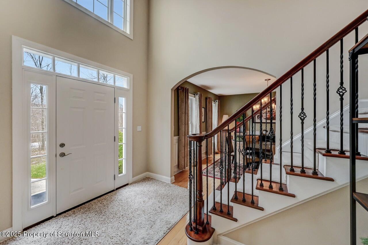 120 Highland Road Moscow, PA 18444 - Photo 60 of 84 a view of an entryway with wooden floor and stairs