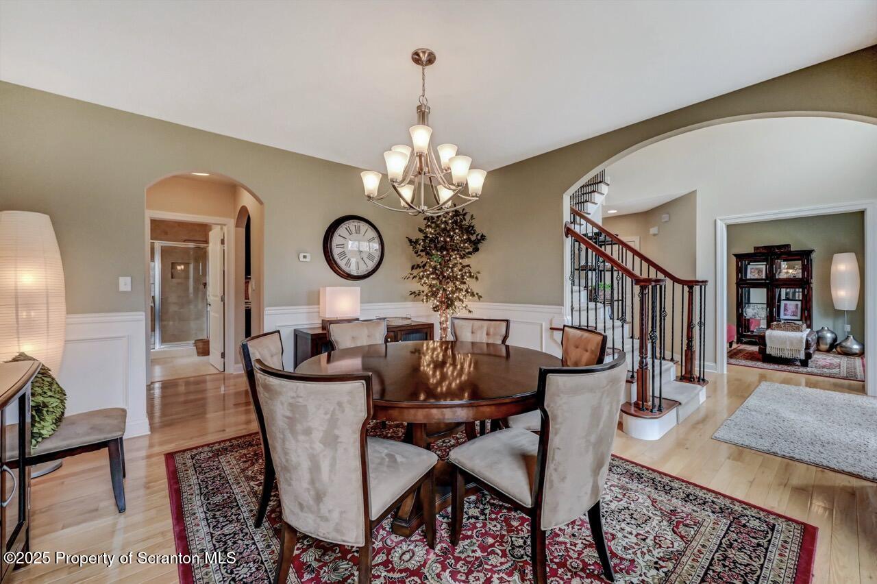 120 Highland Road Moscow, PA 18444 - Photo 7 of 84 a view of a dining room with furniture and chandelier