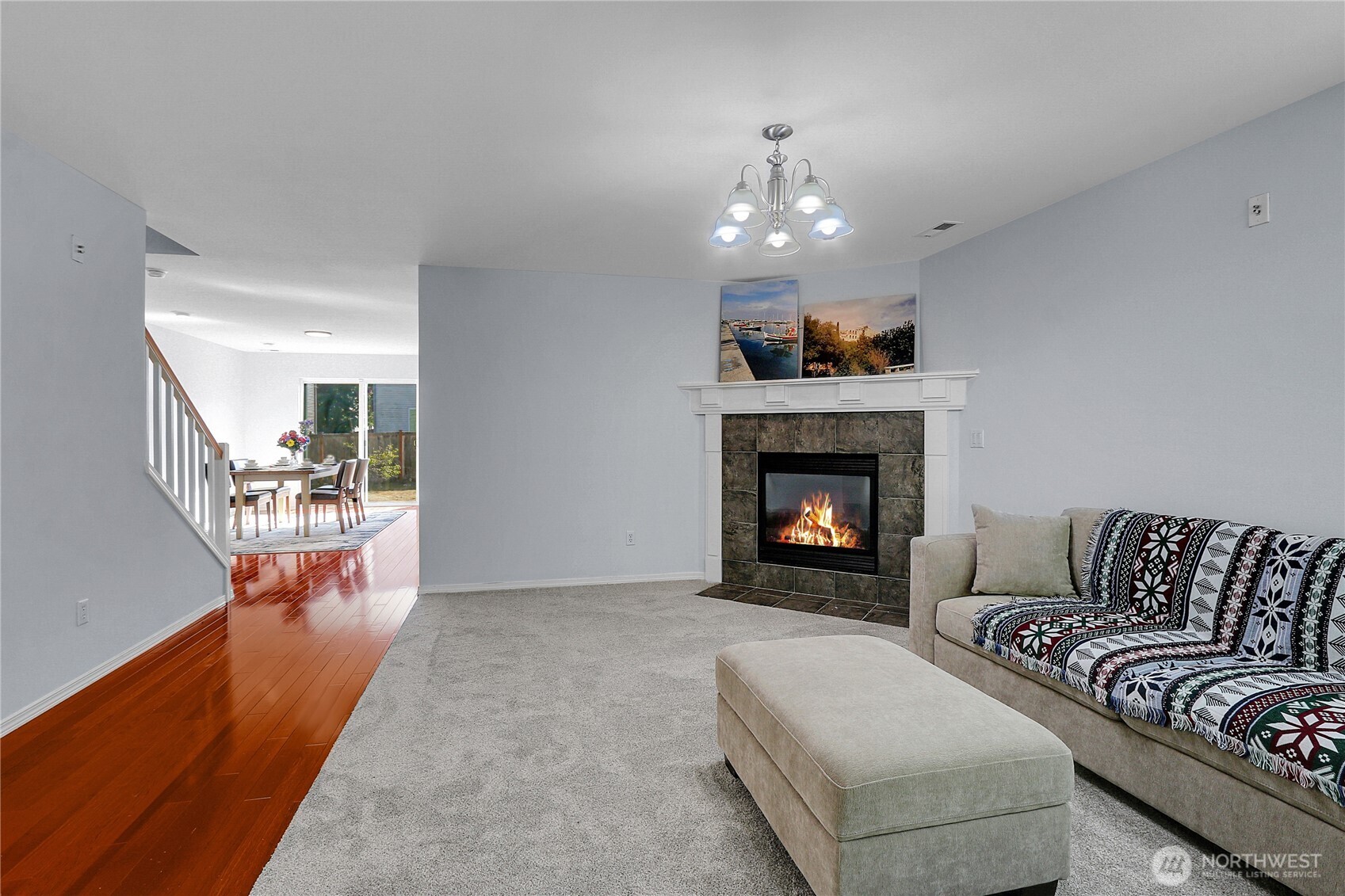 21545 Southeast 298th Place Kent, WA 98042 - Photo 2 of 22 a living room with furniture and a fireplace