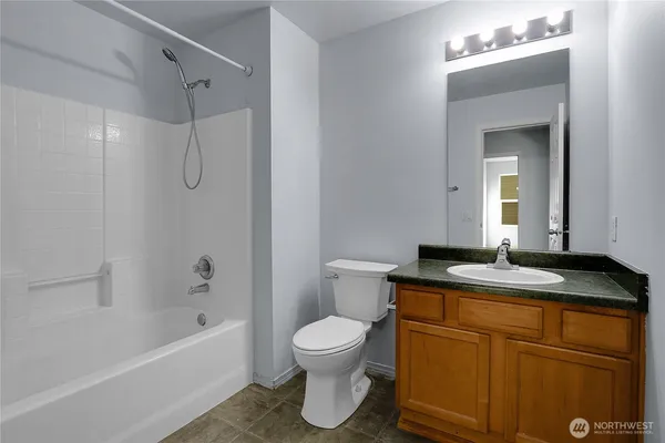 a bathroom with a sink and a yard