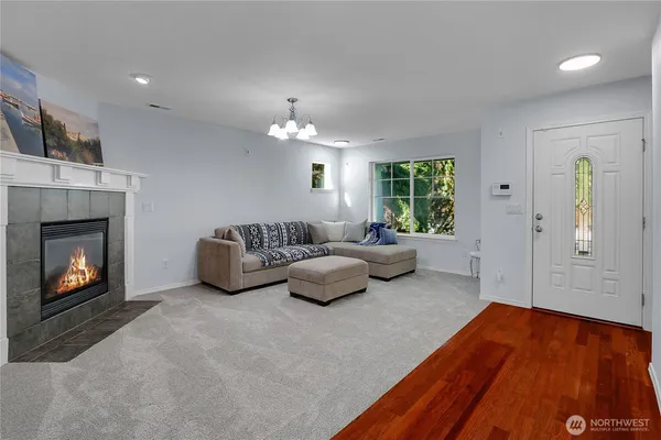 a bedroom with a bed and a fireplace