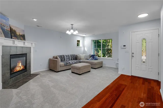 a bedroom with a bed and a fireplace