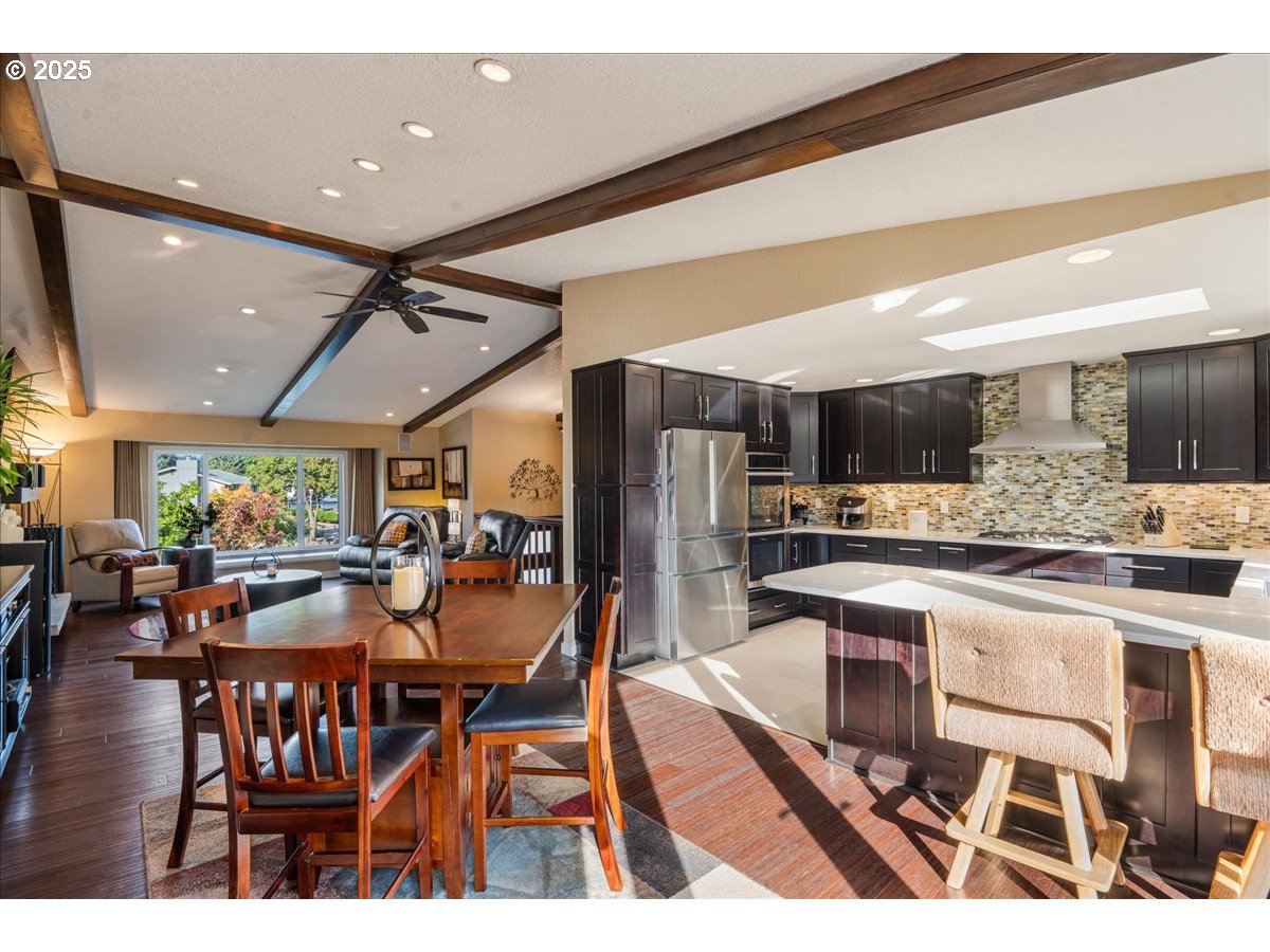 15735 Southwest 88th Avenue Portland, OR 97224 - Photo 11 of 38 a view of a dining area with furniture