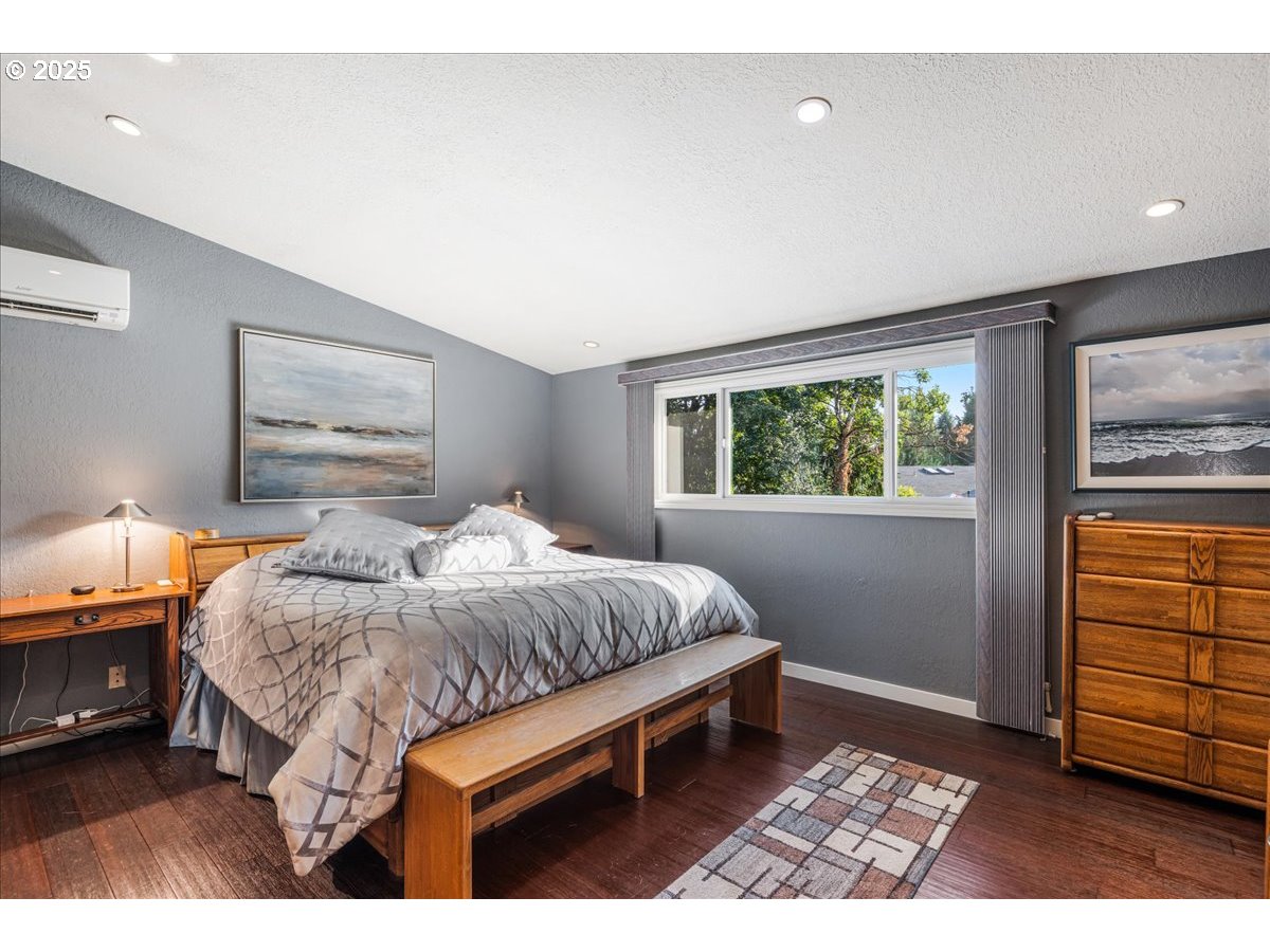 15735 Southwest 88th Avenue Portland, OR 97224 - Photo 17 of 38 a bed room with a bed and a window