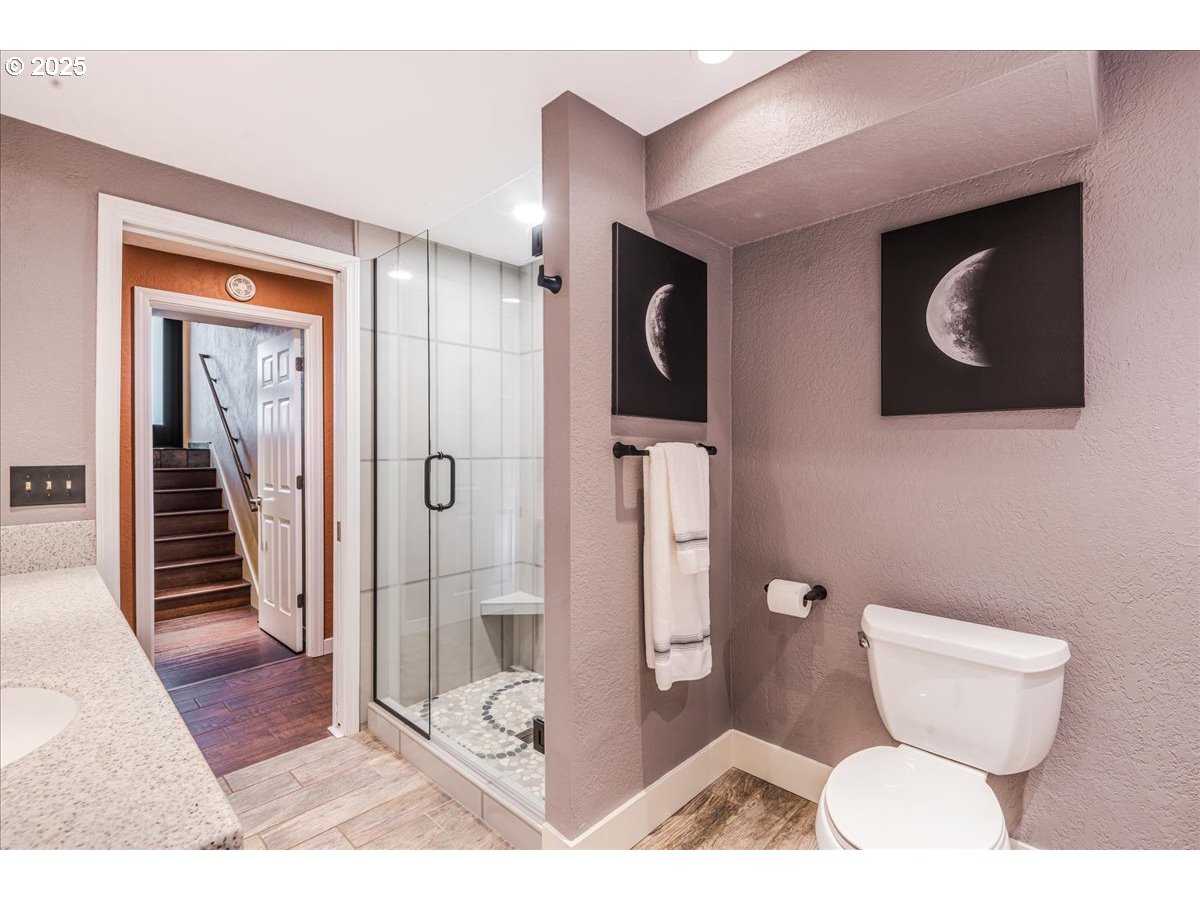 15735 Southwest 88th Avenue Portland, OR 97224 - Photo 26 of 38 a bathroom with a toilet and a sink