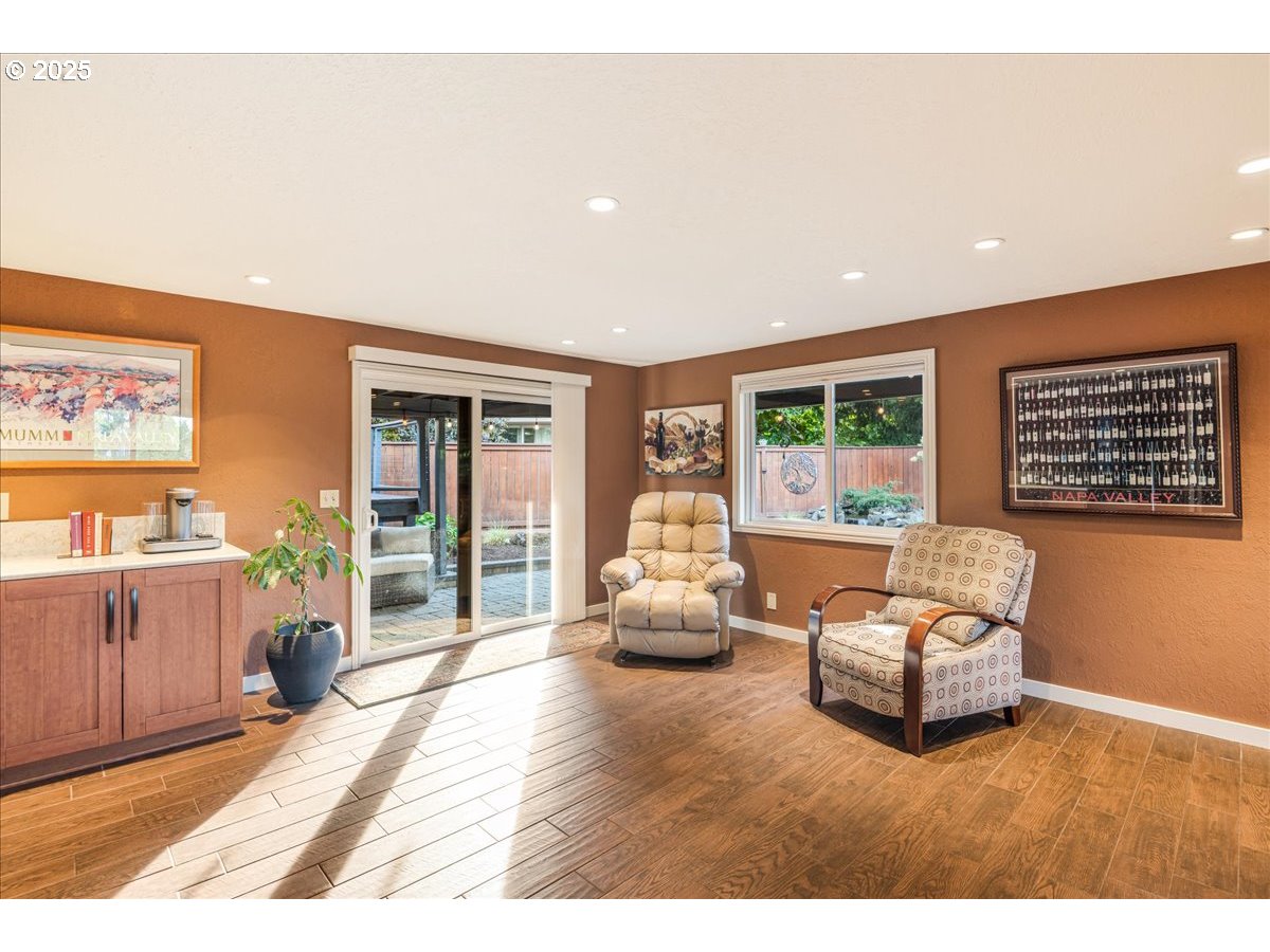 15735 Southwest 88th Avenue Portland, OR 97224 - Photo 27 of 38 a living room with furniture and a large window
