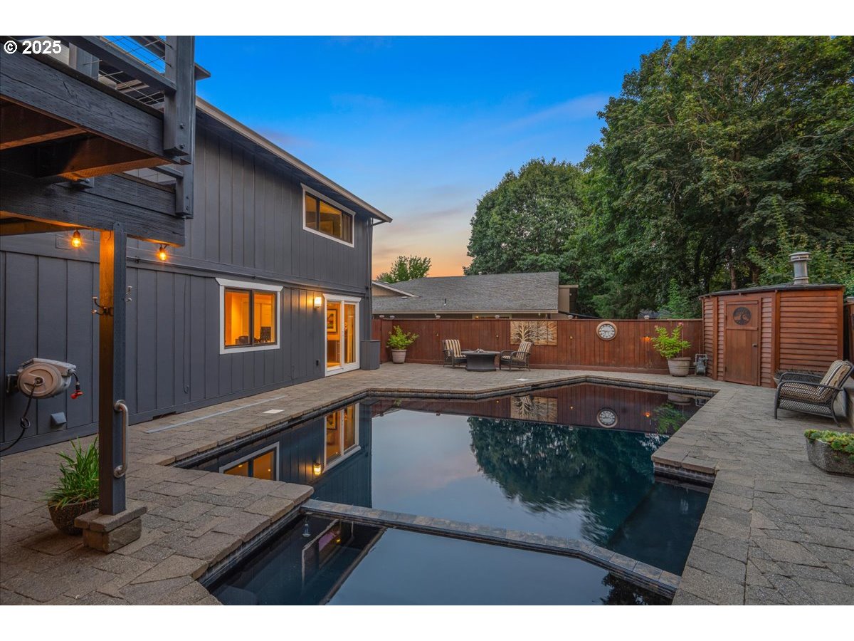 15735 Southwest 88th Avenue Portland, OR 97224 - Photo 33 of 38 a view of a house with backyard and sitting area
