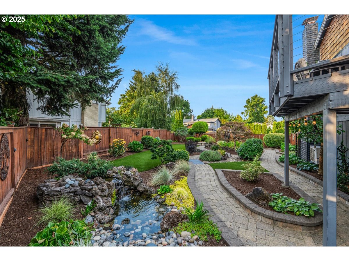 15735 Southwest 88th Avenue Portland, OR 97224 - Photo 37 of 38 a view of a backyard with plants