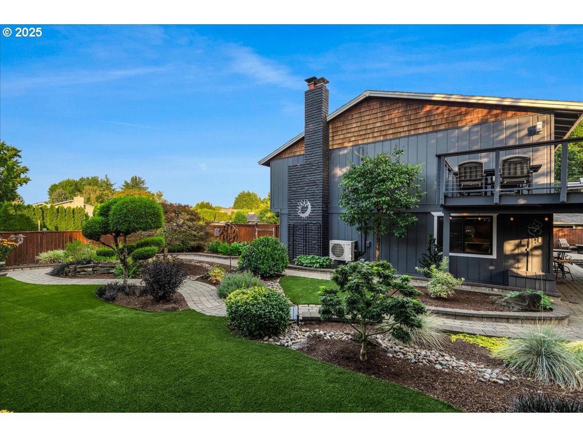 15735 Southwest 88th Avenue Portland, OR 97224 - Photo 38 of 38 a front view of a house with a yard