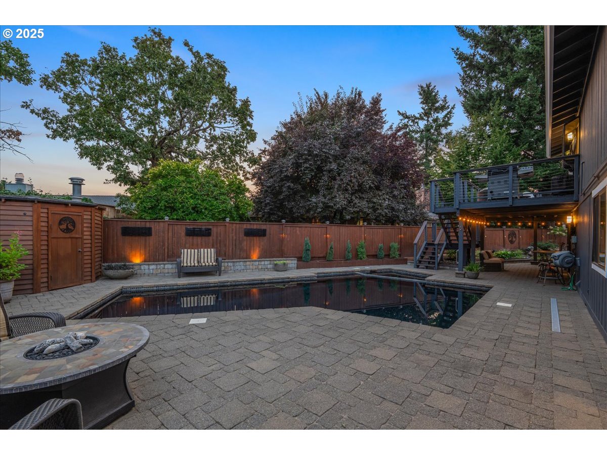 15735 Southwest 88th Avenue Portland, OR 97224 - Photo 5 of 38 a view of a backyard with furniture and a tub