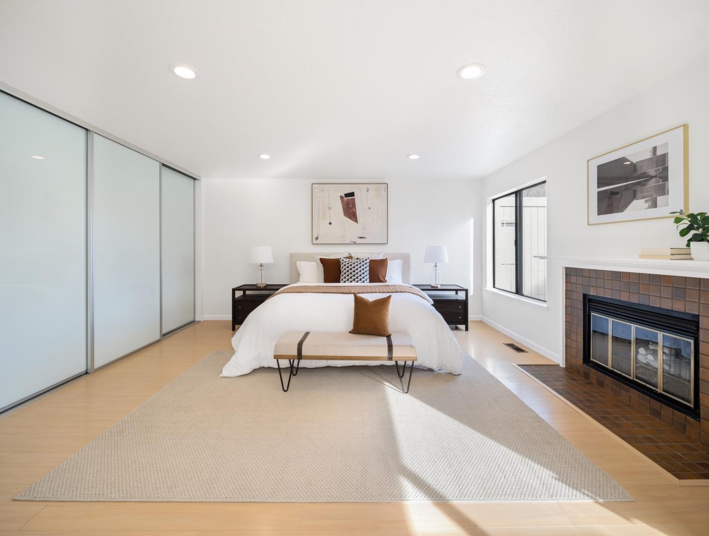 7518 Rosedale Court Pleasanton, CA 94588 - Photo 13 of 27 a bed room with a bed and a fireplace