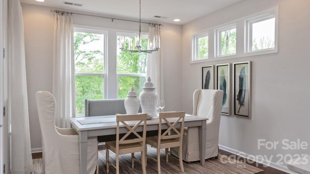 13224 Chopin Ridge Road Huntersville, NC 28078 - Photo 13 of 33 a view of a dining room with furniture window and outside view