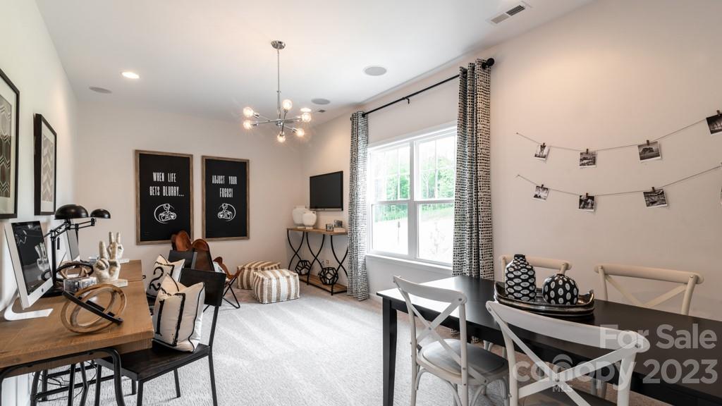 13224 Chopin Ridge Road Huntersville, NC 28078 - Photo 20 of 33 a view of a dining room with furniture window and outside view