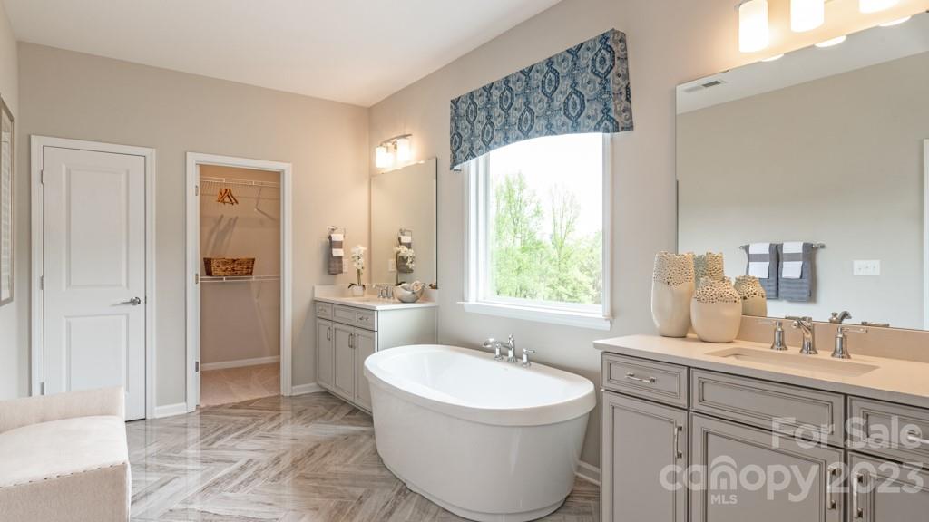 13224 Chopin Ridge Road Huntersville, NC 28078 - Photo 25 of 33 a bathroom with a sink toilet and shower