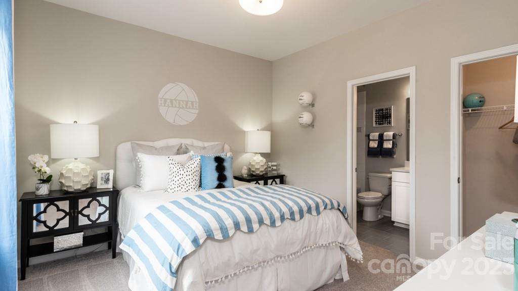 13224 Chopin Ridge Road Huntersville, NC 28078 - Photo 29 of 33 a bedroom with a bed and window