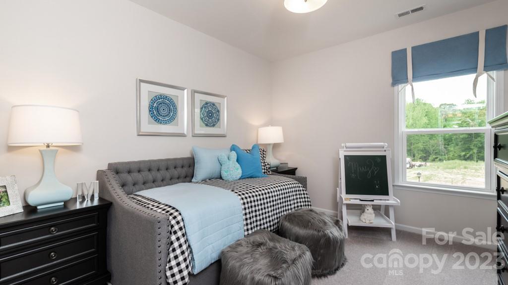 13224 Chopin Ridge Road Huntersville, NC 28078 - Photo 32 of 33 a bedroom with a bed and a window