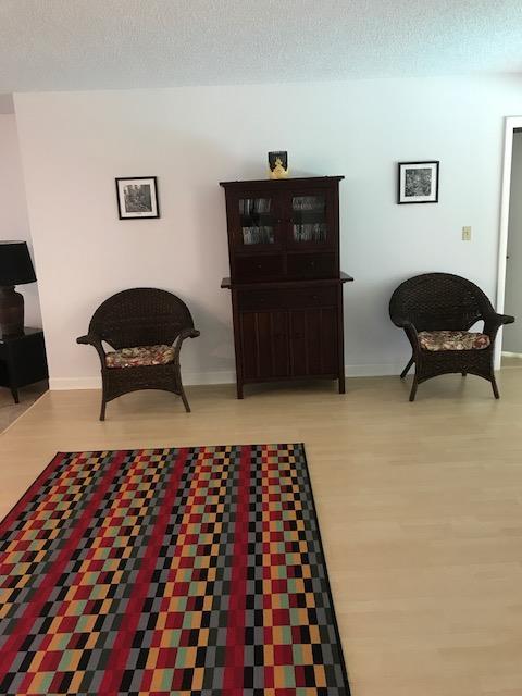 5869 Wind Drift Lane Boca Raton, FL 33433 - Photo 6 of 30 Interior with 2 chairs near fireplace