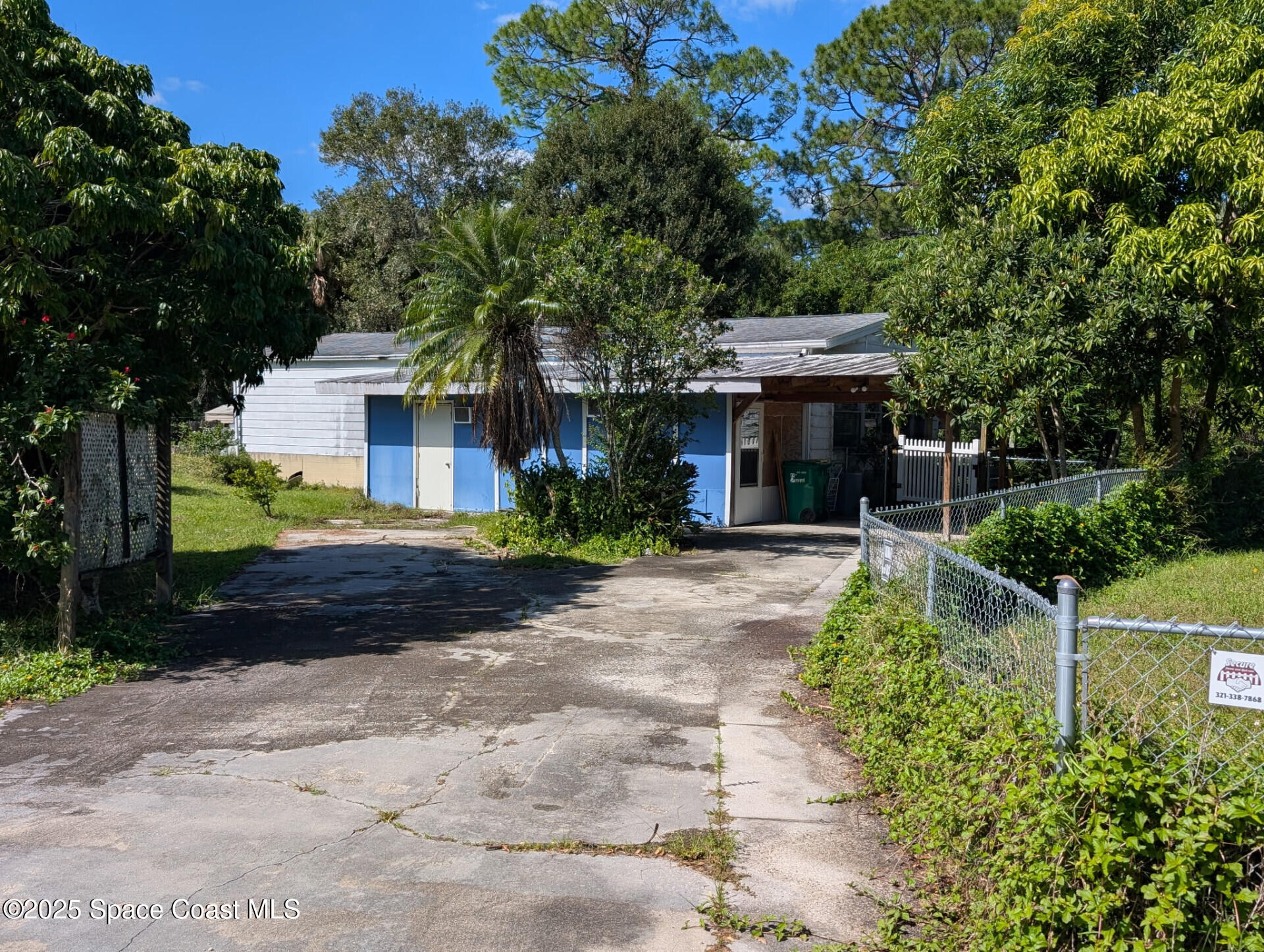 3640 Sandy Pine Place Cocoa, FL 32926 - Photo 1 of 9 a front view of a house with a yard