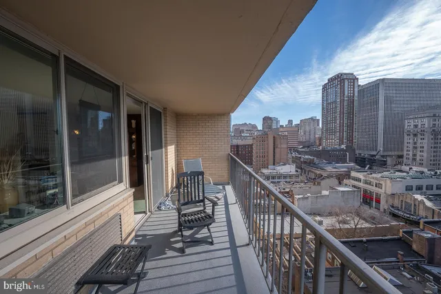 a view of balcony with furniture