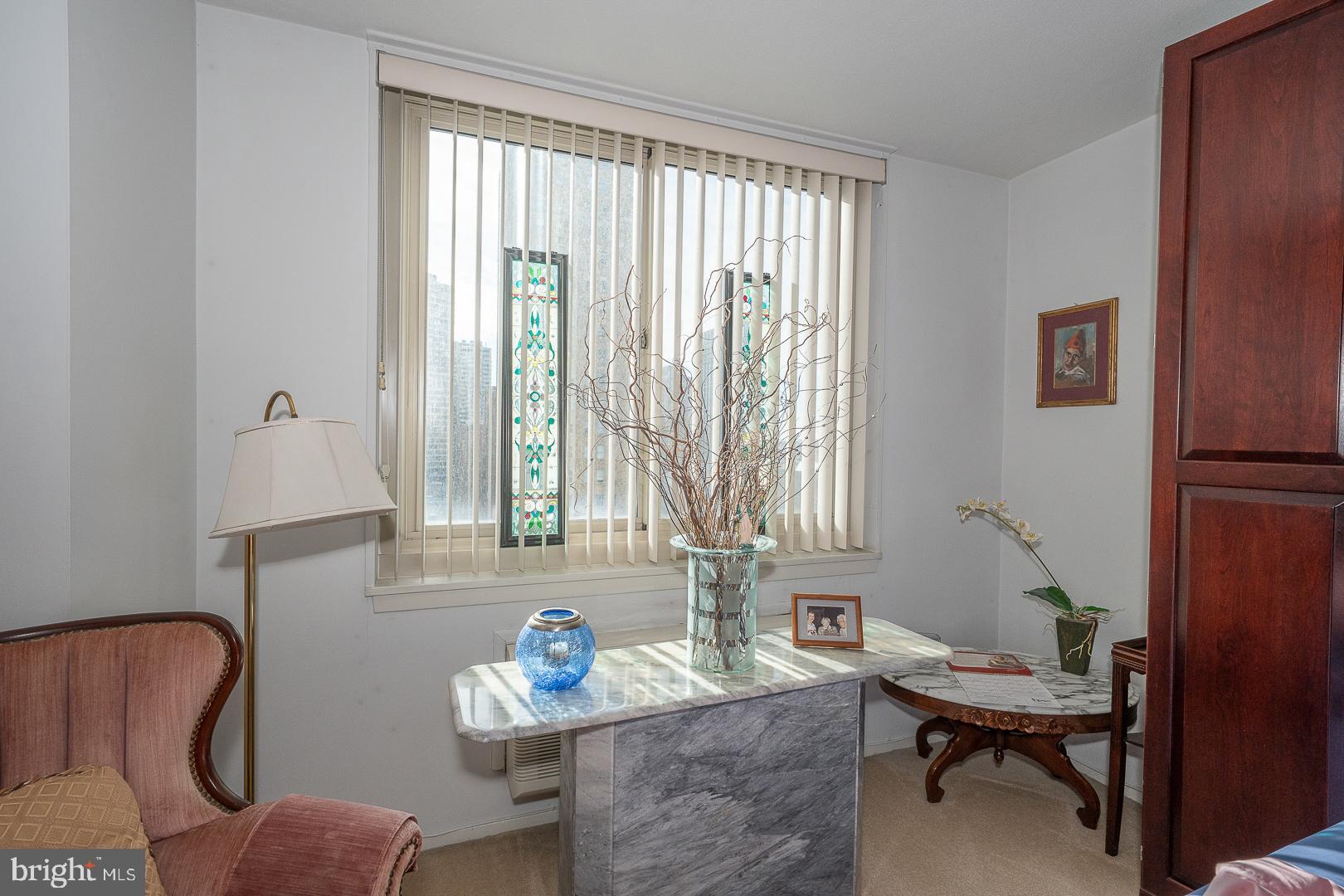 1919 Chestnut Street, Unit 1316 Philadelphia, PA 19103 - Photo 10 of 24 a view of a workspace with furniture and a window