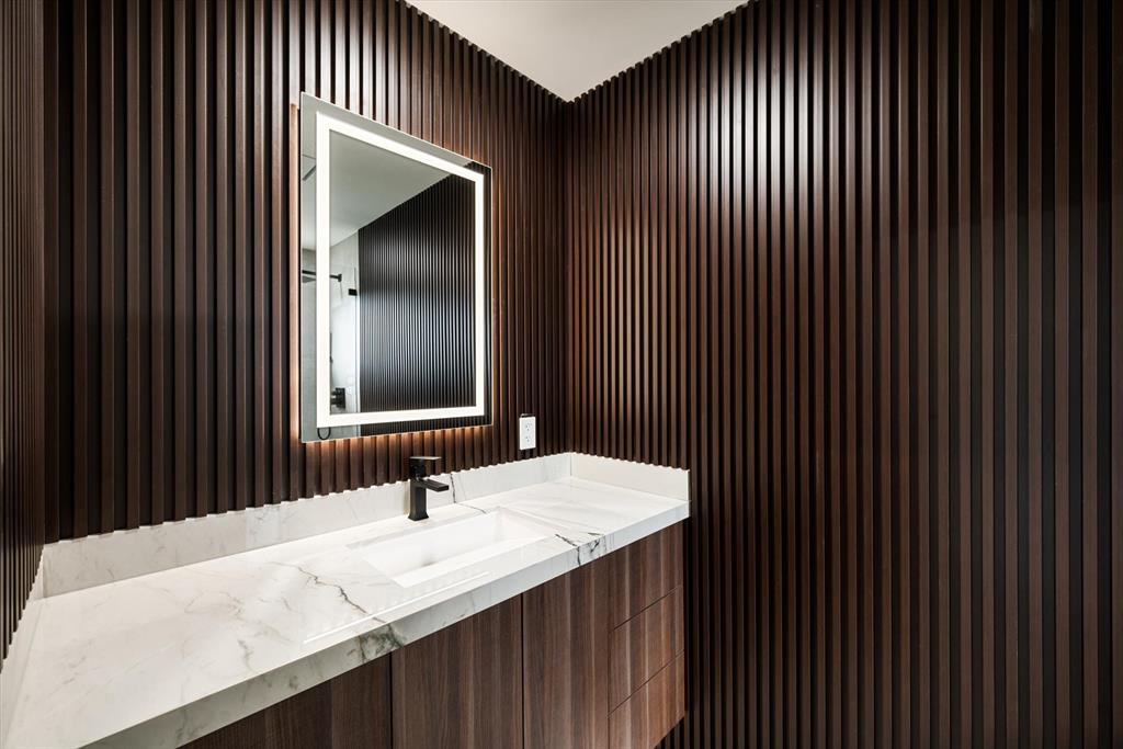 10201 Southwest 64th Street Miami, FL 33173 - Photo 19 of 50 a bathroom with a sink and a mirror