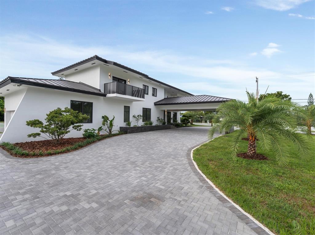 10201 Southwest 64th Street Miami, FL 33173 - Photo 2 of 50 a view of a house with a yard