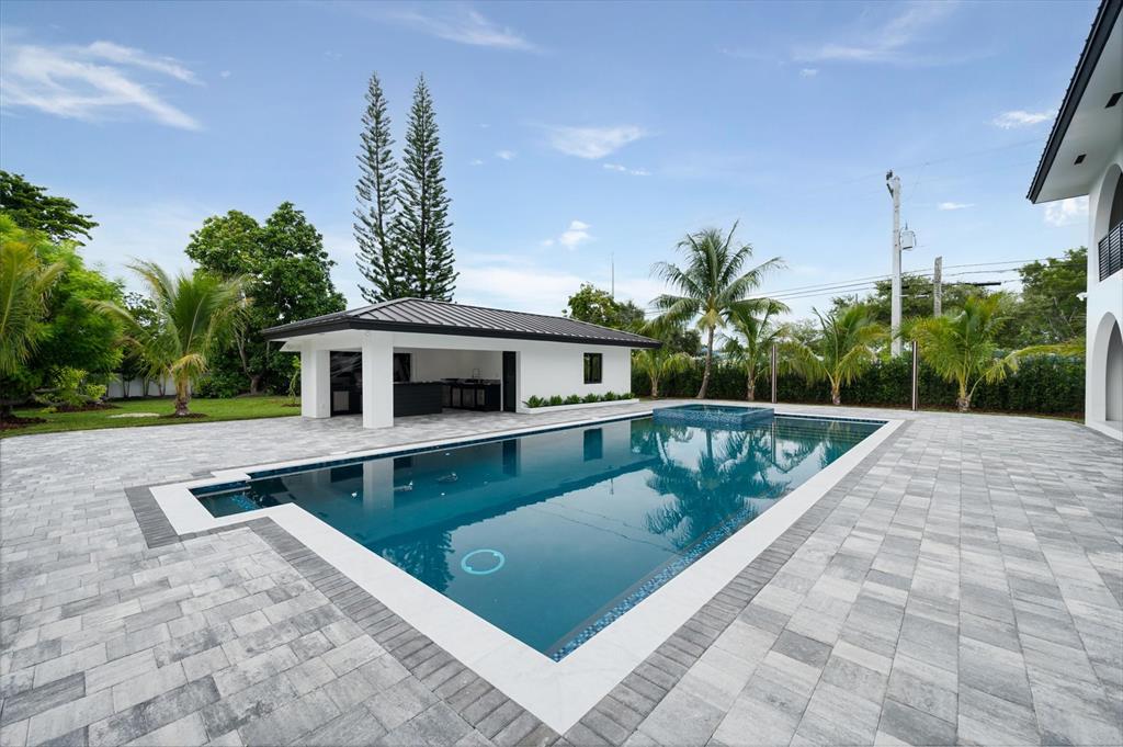 10201 Southwest 64th Street Miami, FL 33173 - Photo 33 of 50 a view of a house with a swimming pool