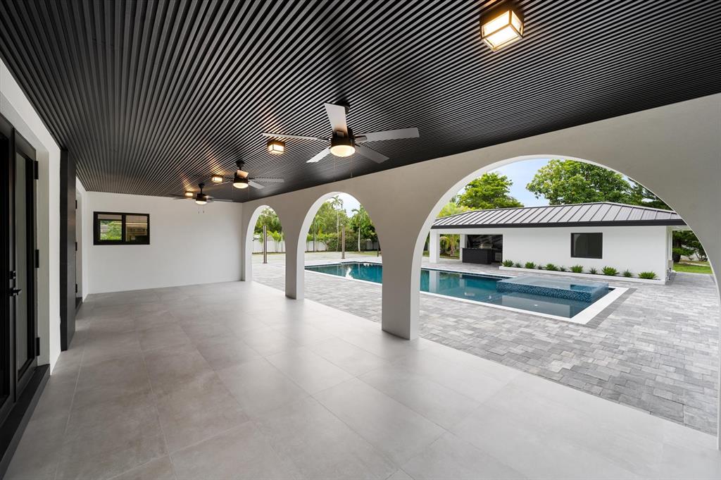 10201 Southwest 64th Street Miami, FL 33173 - Photo 34 of 50 an empty room with fan and windows