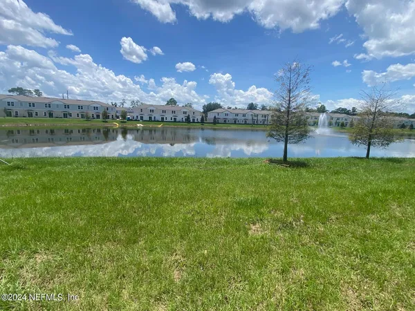 a view of backyard with green space