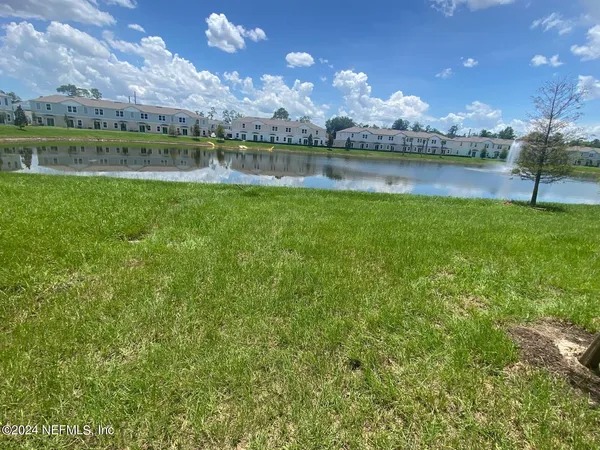 a view of a room with a large window