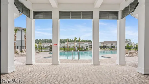 a view of a lake with a house