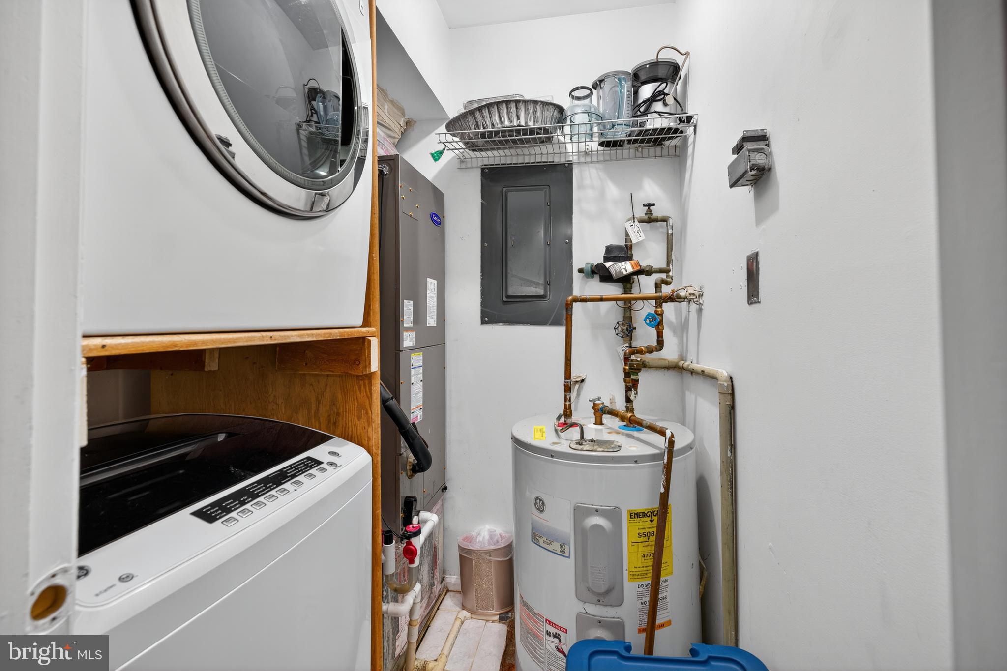 20617 Shadyside Way, Unit 997 Germantown, MD 20874 - Photo 17 of 23 a utility room with dryer and washer