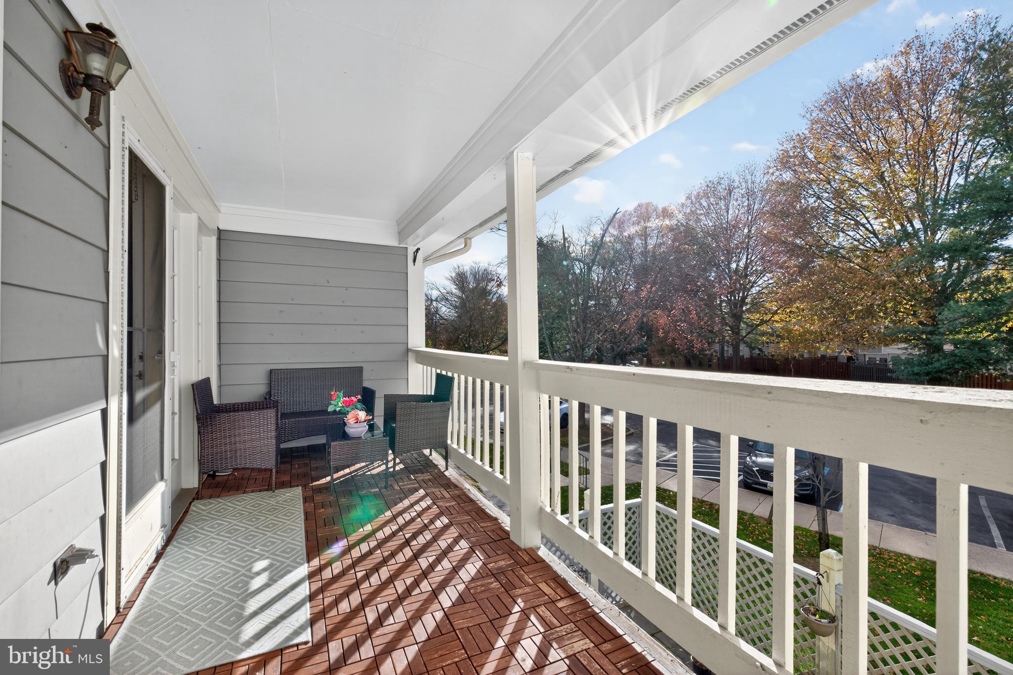 20617 Shadyside Way, Unit 997 Germantown, MD 20874 - Photo 18 of 23 a view of balcony with couch