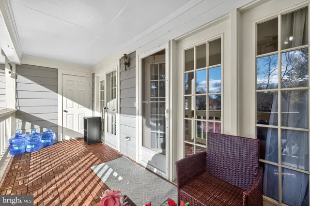 a view of a swimming pool and lounge chairs
