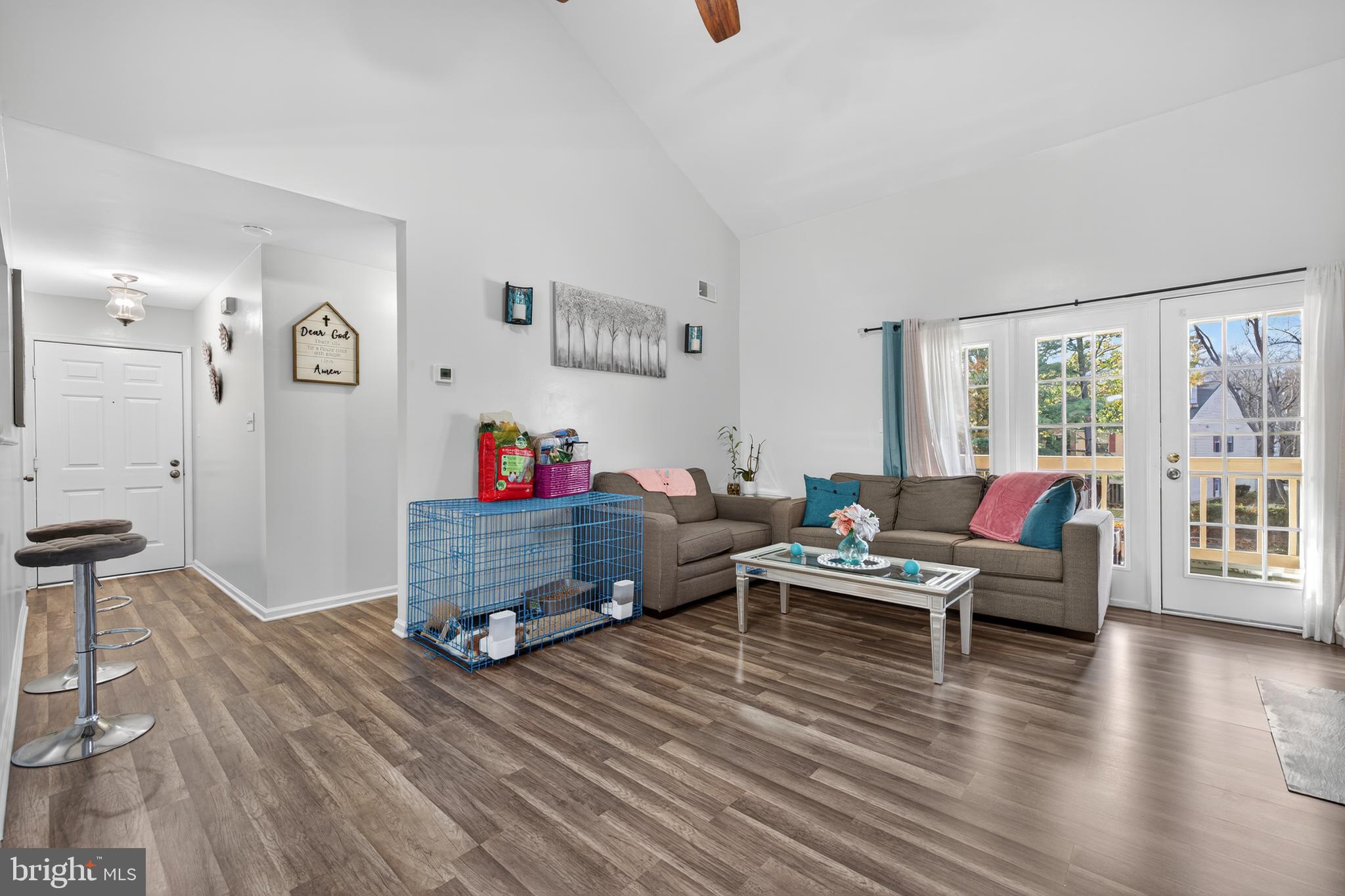 20617 Shadyside Way, Unit 997 Germantown, MD 20874 - Photo 4 of 23 a living room with furniture and a wooden floor