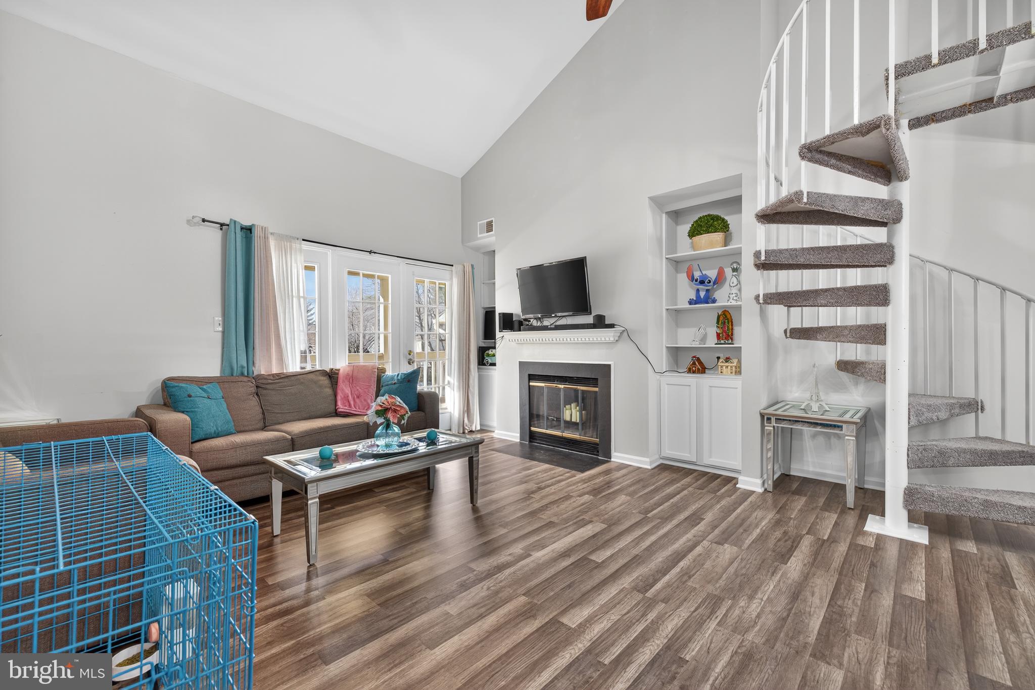 20617 Shadyside Way, Unit 997 Germantown, MD 20874 - Photo 5 of 23 a living room with furniture and a fireplace